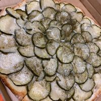 Vegan pickle pizza. Was delicious, but could have had less pickles.  at Pizza Transit in Niles