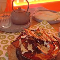 Shakshuka con berenjena y té negro. at Hummus YA! in Mexico City