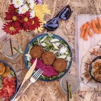 Falafel bowl, homemade hummus platter  at Jungle SV in El Tunco