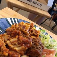 Lasagne, garlic bread  at Vegan Pizza House in Vancouver
