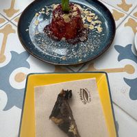 Panna Cotta and small sweet triangle  at Fala Fala in Funchal