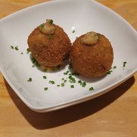 Croquetas de trompetas de la muerte y boniato at La Bicicleta in Barcelona