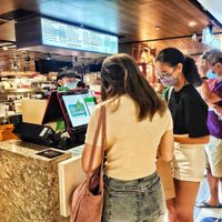 Queueing at Mr Coconut - Raffles Place in Central Singapore