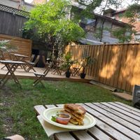 Amazing backyard patio like a little high park getaway  at Caked Coffee in Toronto