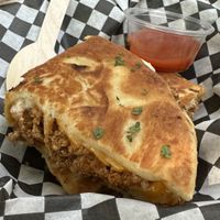 Bibi: scrambled tofu in cheezy naann  at Caked Coffee in Toronto