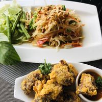 Papaya salad (som tum) and vegan nuggets  at Plant-erian in Krabi