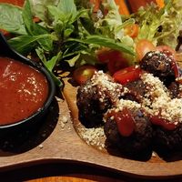 Veg protein balls in a rich tomato sauce at Plant-erian in Krabi