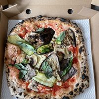Vegan Contadina Pizza: 
San Marzano Tomato Dop, Vegan Mozzarella, Aubergine, Courgette, Mushrooms, Olives & Basil.  at Paesani in Sheffield