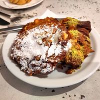 Stuffed and topped croissant and pain au chocolat with pistachios, almonds and hazelnuts at Saint-Jean in Amsterdam