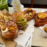 Brioches, seasonal cruffins, and an orange hazelnut pastry at Saint-Jean in Amsterdam