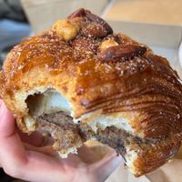 Croissant with a really delicious hazelnut paste inside, topped with candied nuts at Saint-Jean in Amsterdam