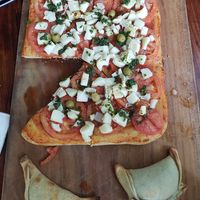 Pizza and empanadas at El Hornito in Uvita