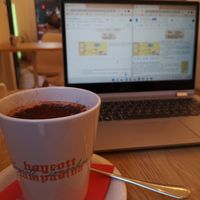 Soy latte with cacao on top at Lampadina in Bologna
