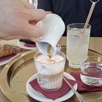 Oat milk latte and lemonade at Lampadina in Bologna