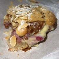 this was the almond croissant i believe, first bite 12/10 i got the cream i got the jam i got the bakewell tart flavour and fluffiness of the croissant!   at Tokyo Vegan Bakes in Tokyo