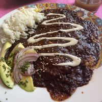 Homemade corn tortillas with frijoles filling and mole  at Azteca Tasting in Naron