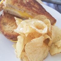 classic grilled cheese with potato chips at The Mercury Café in New Castle