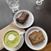 Banana walnut bread, caramel fudge brownie and matcha latte  at Lazy Cow Bakery in Seattle
