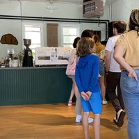 Empty, then suddenly slammed after I walked in.  at Lazy Cow Bakery in Seattle