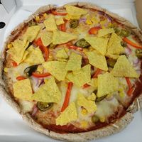 Pizza with mock cheese and nachos - vegan. at RAJ in Bialystok