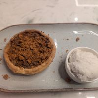 Biscoff apple crumble tart with vegan vanilla ice cream at Heavenly Desserts - Cambridge in Cambridge