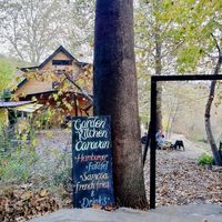 Entrance and menu  at Garden Kitchen Caravan in Antalya