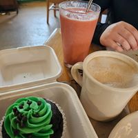 Cappuccino, smoothie, and a takeaway cupcake at Wild Chestnut Cafe in Florence