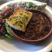 Mushroom bourgignon, garlic bread and 5 salads  at Cafe Roya in Beeston