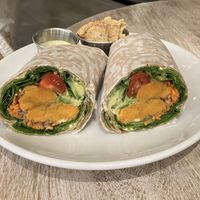 Crunchy veggie wrap (comes with pita chips and green goddess dressing )  at Pura Vida in West Palm Beach