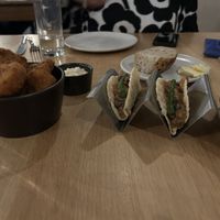 Cauliflower fritters w aioli and black bean tacos    at SlowBurn in East London