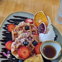 Croffle with choc sauce and berries at Pancha Cafe in Hamilton