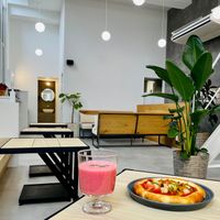 A red sauce pizza and the Pink Smoothie at Cafe Planet in Kyoto