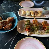 Cauliflower bites, plant based gyozas, bbq tofu bites   at Vegan Pind in Staines-upon-thames