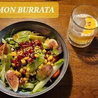 MON BURRATA Salat with Burrata cheese, figs, pomegranate seeds, corn in delicious pesto at Mon in Berlin