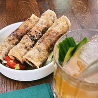 Crispy spring rolls filled with tofu, glass noodles, mushrooms, and cabbage. at Mon in Berlin