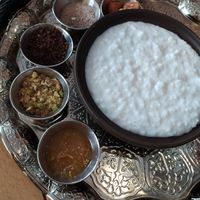 rice in coconut milk with a lot of toppings at Babka Budapest in Budapest