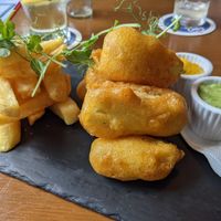 Cider battered tofu, chunky chips, pea & basil puree, lemon curd dip at The Continental in Preston