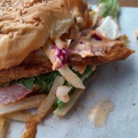 Here is the mess of a sandwich with the 2mm shoe leather "patty" square like shoe leather with the white uncooked fries at The Vegan Chef - Sandton in Johannesburg