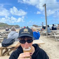 Drinking Cornish cider on the beach, what’s better than this? at The Watering Hole in Perranporth