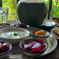 Vegan Mezza plate and fresh coconut drink. at Yoga House in Koh Phangan