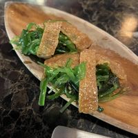 Inari (tofu skin, with rice and seaweed salad inside)   at Sakura Sushi & Grill in Hilo