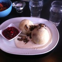 Traditional Swedish "husman" från Gotland or Öland - kroppkakor, served with gravy, mushroom and lingonberry. Boy oh boy! at Kao's in Malmo