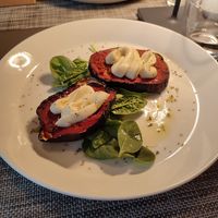 Eggplants topped with tomato sauce and vegan cheese at Azalea Park Hotel in Cavalese