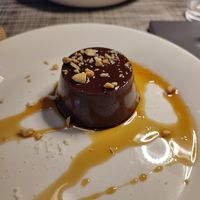 Chocolate pudding with chopped peanuts at Azalea Park Hotel in Cavalese
