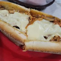Veg "chicken" cheeze steak with provolone, marinara, onions, and mushrooms. Also, pictured the eggplant fries. at Fingers Wings and Other Things in Conshohocken