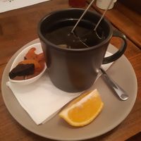 A green tea : served with a slice of lemon and some dried fruits #Veganuary at VegANGELov  in Belgrade
