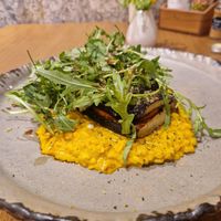 Baked eggplant on turmeric risooto at VegANGELov  in Belgrade