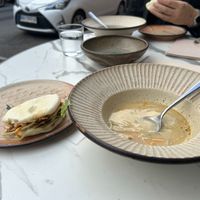Tom kha soup and bau bun. Order the bau bun! It is excellent! at VegANGELov  in Belgrade
