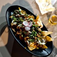Chilaquiles veganos. Tenían bastante cantidad de carne soja que tenía un sabor súper rico. Nos encantó. Muy recomendable este plato. at Taquería La Lupe Alameda in Sevilla