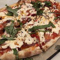 Vegan diavola with vegan cream at Gusto Pinsa Romana in San Francisco